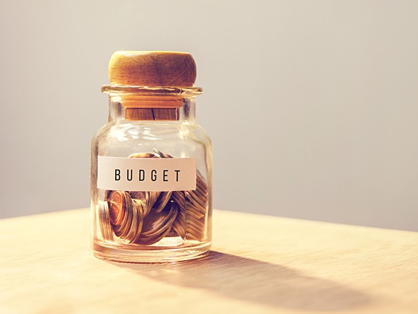 Jar of money labelled 'budget'